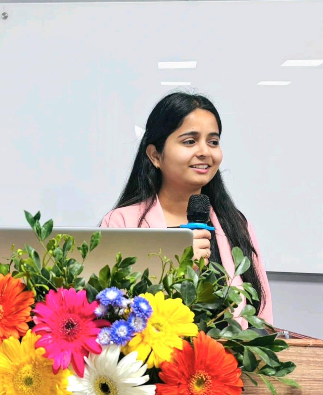 Dr. Sanjana Upadhyay speaking at a workshop